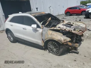 2024 Cadillac XT4 AWD Premium Luxury with VIN 1GYFZDR45RF102198, listed as a Copart auction lot 54240675 with Not Provided miles and Salvage Title. Bid and sale history available at carsss.com. Image 4.