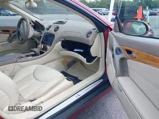 2005 Mercedes-Benz SL 500 z VIN WDBSK75F65F096681, wystawiony jako IAAI lot #42305663 z przebiegiem 65 001 mil mil oraz . Historia ofert i sprzedaży dostępna na DreamBid. Obrazek 5.