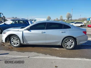 2018 Chevrolet Malibu LT z VIN 1G1ZD5ST1JF261841, wystawiony jako IAAI lot #41887177 z przebiegiem 128 213 mil mil oraz . Historia ofert i sprzedaży dostępna na DreamBid. Obrazek 15.