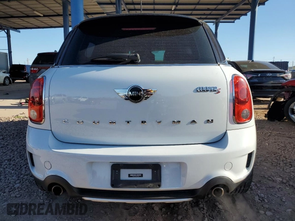 2015 MINI Countryman S with VIN WMWZC5C53FWP44388, listed as a Copart auction lot 54560585 with 67,913 mi miles and Salvage Title. Bid and sale history available at DreamBid. Image 6.