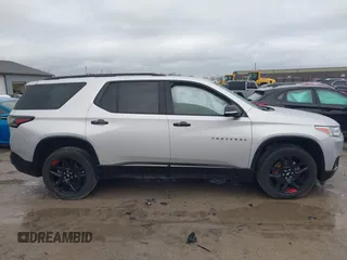 2020 Chevrolet Traverse Premier with VIN 1GNEVKKW4LJ284338, listed as a IAAI auction lot 41912758 with 74,496 mi miles and . Bid and sale history available at DreamBid. Image 13.