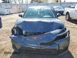 2022 Honda Civic LX z VIN 2HGFE2F26NH131275, wystawiony jako Copart lot #56547825 z przebiegiem 4205 mil mil oraz Czysty tytuł • Clean title. Historia ofert i sprzedaży dostępna na DreamBid. Obrazek 5.