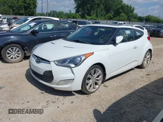 2013 Hyundai Veloster w/Black Int with VIN KMHTC6AD2DU131983, listed as a IAAI auction lot 42671646 with 131,731 mi miles and . Bid and sale history available at DreamBid. Image 2.