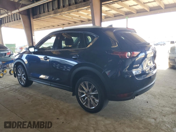 2019 Mazda CX-5 Grand Touring with VIN JM3KFADM3K1539890, listed as a Copart auction lot 57809835 with 56,079 mi miles and Salvage title. Bid and sale history available at DreamBid. Image 2.