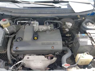 2003 Suzuki Aerio S z VIN JS2RA41S735169831, wystawiony jako IAAI lot #42025965 z przebiegiem 214 238 mil mil oraz . Historia ofert i sprzedaży dostępna na DreamBid. Obrazek 10.