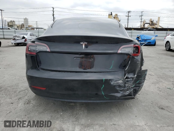 2022 Tesla Model 3 with VIN 5YJ3E1EA3NF190102, listed as a Copart auction lot 50657535 with 73,015 mi miles and Salvage Title. Bid and sale history available at DreamBid. Image 6.