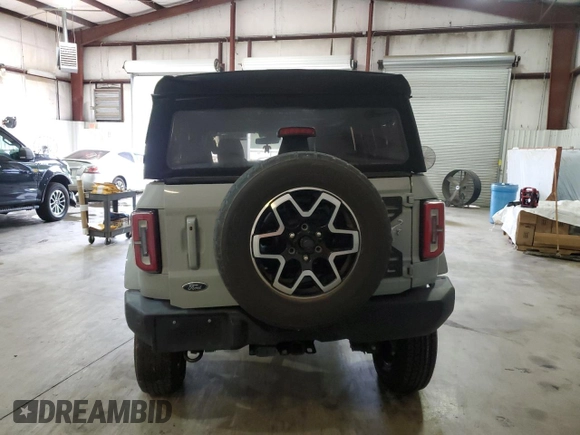 2021 Ford Bronco с VIN 1FMEE5BP2MLA78441, выставлен на аукционе Copart как лот 80878314 с пробегом 42 136 миль миль и Списание • Salvage title. История ставок и продаж доступна на DreamBid. Изображение 6.