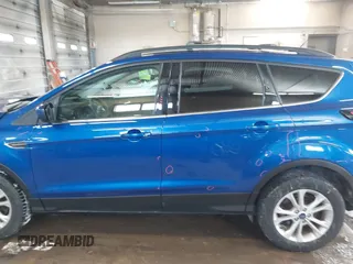2018 Ford Escape SE z VIN 1FMCU9GD1JUB80500, wystawiony jako IAAI lot #41613294 z przebiegiem 112 187 mil mil oraz . Historia ofert i sprzedaży dostępna na DreamBid. Obrazek 14.