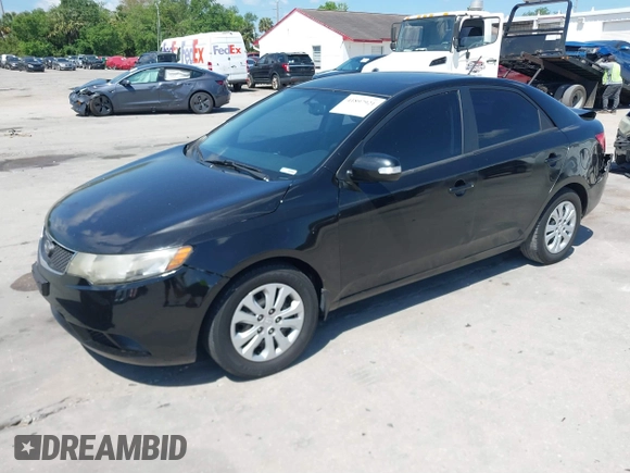 2010 Kia Forte EX with VIN KNAFU4A20A5847351, listed as a IAAI auction lot 41897921 with 129,084 mi miles. Bid and sale history available at carsss.com. Image 2.
