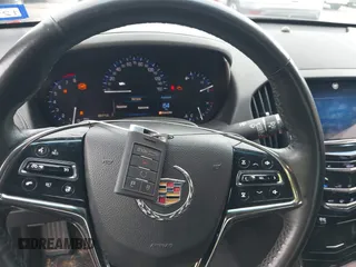 2014 Cadillac ATS Luxury AWD z VIN 1G6AH5R30E0150854, wystawiony jako IAAI lot #42422421 z przebiegiem 96 713 mil mil oraz . Historia ofert i sprzedaży dostępna na DreamBid. Obrazek 11.