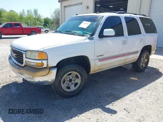 2005 GMC Yukon SLT with VIN 1GKEC13T35J128179, listed as a IAAI auction lot 41985296 with 255,582 mi miles. Bid and sale history available at carsss.com. Image 2.