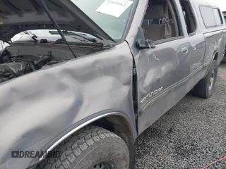 2000 Toyota Tundra SR5 with VIN 5TBRT3414YS086059, listed as a IAAI auction lot 41609962 with 105,030 mi miles and . Bid and sale history available at DreamBid. Image 13.