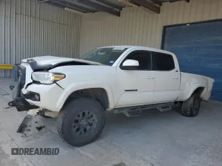 2021 Toyota Tacoma SR5 z VIN 3TMBZ5DN6MM031399, wystawiony jako Copart lot #82078704 z przebiegiem 139 358 mil mil oraz Czysty tytuł • Clean title. Historia ofert i sprzedaży dostępna na DreamBid. Obrazek 1.