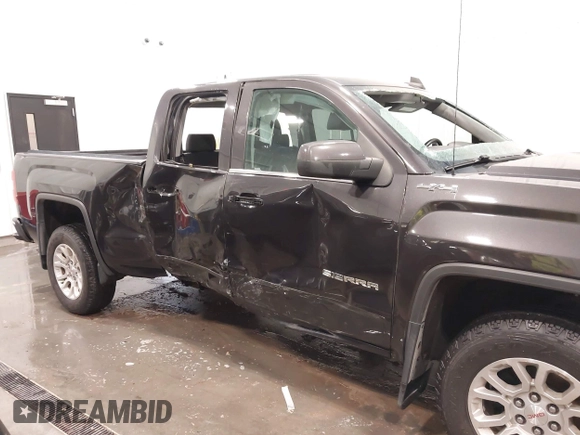 2015 GMC Sierra 1500 SLE with VIN 1GTV2UEC0FZ151760, listed as a IAAI auction lot 41988450 with 124,674 mi miles. Bid and sale history available at carsss.com. Image 6.