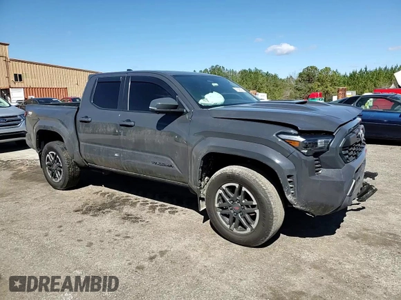 2024 Toyota Tacoma SR5 z VIN 3TMLB5JN2RM017259, wystawiony jako Copart lot #47946465 z przebiegiem 29 596 mil mil oraz Szkoda całkowita • Salvage title. Historia ofert i sprzedaży dostępna na DreamBid. Obrazek 11.