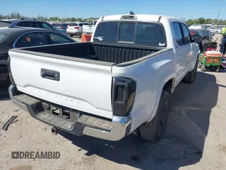 2021 Toyota Tacoma SR with VIN 3TYAX5GN6MT016452, listed as a IAAI auction lot 41816457 with 30,617 mi miles and . Bid and sale history available at DreamBid. Image 4.