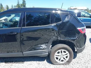 2018 Jeep Compass Sport with VIN 3C4NJDAB1JT261863, listed as a IAAI auction lot 42677037 with 93,263 mi miles and . Bid and sale history available at DreamBid. Image 6.