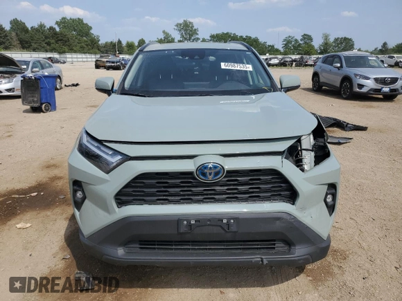 2022 Toyota RAV4 Hybrid XLE Premium with VIN 4T3B6RFV8NU101319, listed as a Copart auction lot 60987535 with 100,070 mi miles and Salvage title. Bid and sale history available at DreamBid. Image 5.