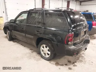 2005 Chevrolet TrailBlazer LT with VIN 1GNDT13S152249874, listed as a IAAI auction lot 42071247 with 165,616 mi miles. Bid and sale history available at carsss.com. Image 3.