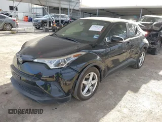 2019 Toyota C-HR XLE with VIN JTNKHMBX4K1032039, listed as a IAAI auction lot 41365721 with 96,194 mi miles. Bid and sale history available at carsss.com. Image 18.