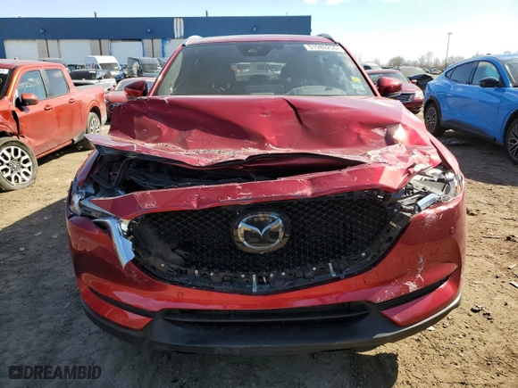 2021 Mazda CX-5 Signature with VIN JM3KFBEYXM0434778, listed as a Copart auction lot 51980255 with 34,283 mi miles and Salvage Title. Bid and sale history available at carsss.com. Image 5.
