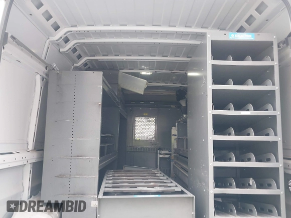 2018 Ram ProMaster Cargo with VIN 3C6URVHG7JE116351, listed as a IAAI auction lot 41564858 with 64,651 mi miles and . Bid and sale history available at DreamBid. Image 19.