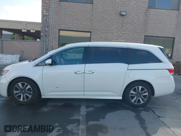 2015 Honda Odyssey Touring Elite with VIN 5FNRL5H9XFB102222, listed as a IAAI auction lot 42485059 with 123,562 mi miles and . Bid and sale history available at DreamBid. Image 14.