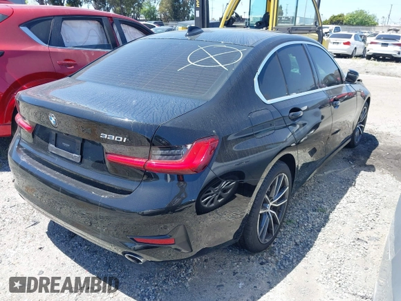 2021 BMW 3 Series 330i with VIN 3MW5R1J09M8C21377, listed as a IAAI auction lot 41892259 with Not Provided miles and . Bid and sale history available at carsss.com. Image 4.