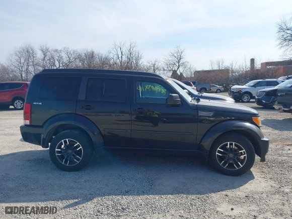 2010 Dodge Nitro SXT with VIN 1D4PU5GK0AW134368, listed as a IAAI auction lot 41786095 with 117,563 mi miles. Bid and sale history available at carsss.com. Image 13.