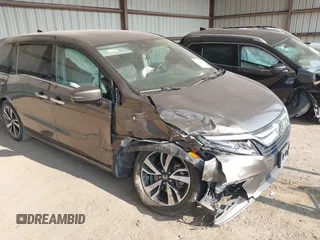 2020 Honda Odyssey Elite with VIN 5FNRL6H9XLB064282, listed as a IAAI auction lot 42388412 with 94,729 mi miles and . Bid and sale history available at DreamBid. Image 1.