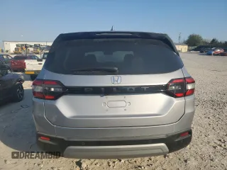 2025 Honda Pilot EX-L z VIN 5FNYG2H44SB000413, wystawiony jako Copart lot #50594725 z przebiegiem 6 075 mil mil oraz Szkoda całkowita • Salvage title. Historia ofert i sprzedaży dostępna na DreamBid. Obrazek 6.