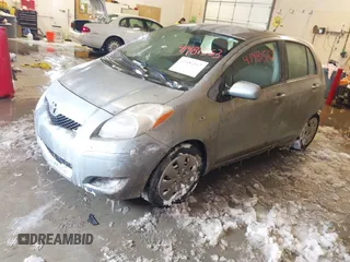 2010 Toyota Yaris with VIN JTDKT4K3XA5290654, listed as a IAAI auction lot 41481563 with 115,012 mi miles. Bid and sale history available at carsss.com. Image 2.