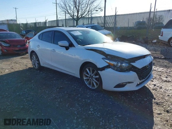 2017 Mazda 3 Touring with VIN 3MZBN1V75HM122123, listed as a IAAI auction lot 41853726 with 100,641 mi miles and . Bid and sale history available at DreamBid. Image 1.