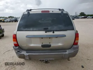 2003 Jeep Grand Cherokee Laredo with VIN 1J4GX48S13C609036, listed as a Copart auction lot 63143505 with 127,188 mi miles and Clean title. Bid and sale history available at DreamBid. Image 6.