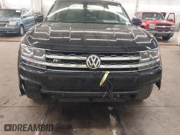 2018 Volkswagen Atlas SEL z VIN 1V2RR2CAXJC548261, wystawiony jako IAAI lot #41650478 z przebiegiem 123 399 mil mil oraz . Historia ofert i sprzedaży dostępna na DreamBid. Obrazek 6.