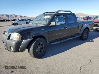 2002 Nissan Frontier SE with VIN 1N6ED29X72C381947, listed as a Copart auction lot 73347714 with 220,683 mi miles and Salvage title. Bid and sale history available at DreamBid. Image 1.