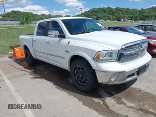 2015 Ram 1500 Laramie Limited with VIN 1C6RR7PT6FS612875, listed as a IAAI auction lot 42331860 with 149,754 mi miles and . Bid and sale history available at DreamBid. Image 1.