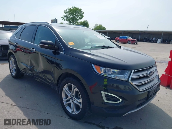 2015 Ford Edge Titanium z VIN 2FMTK3K87FBC06852, wystawiony jako IAAI lot #42335238 z przebiegiem 187 256 mil mil oraz . Historia ofert i sprzedaży dostępna na DreamBid. Obrazek 1.