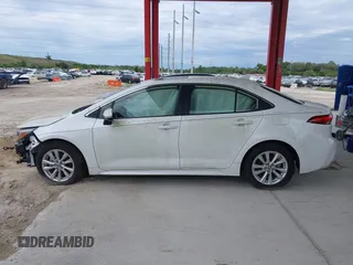 2023 Toyota Corolla Hybrid LE with VIN JTDBCMFE8P3012027, listed as a IAAI auction lot 41517460 with 4,424 mi miles. Bid and sale history available at carsss.com. Image 14.