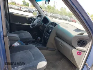 2002 Hyundai Santa Fe GLS with VIN KM8SC73D22U148410, listed as a IAAI auction lot 42159042 with 141,232 mi miles. Bid and sale history available at carsss.com. Image 5.