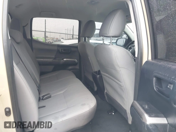 2016 Toyota Tacoma SR5 with VIN 3TMDZ5BN3GM003351, listed as a IAAI auction lot 41721932 with 100,774 mi miles and . Bid and sale history available at DreamBid. Image 8.