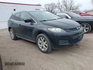 2009 Mazda CX-7 Grand Touring with VIN JM3ER29L490225398, listed as a IAAI auction lot 41558110 with 132,829 mi miles. Bid and sale history available at carsss.com. Image 1.