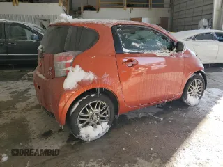 2015 Scion iQ with VIN JTNJJXB09FJ030667, listed as a Copart auction lot 87321594 with 124,895 mi miles and Salvage Title. Bid and sale history available at carsss.com. Image 3.