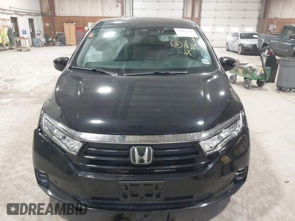 2023 Honda Odyssey Elite z VIN 5FNRL6H95PB016114, wystawiony jako IAAI lot #41865786 z przebiegiem 32 700 mil mil oraz . Historia ofert i sprzedaży dostępna na DreamBid. Obrazek 13.