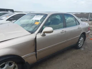 2000 Acura RL with VIN JH4KA9650YC007357, listed as a IAAI auction lot 42050343 with 1 mi miles. Bid and sale history available at carsss.com. Image 13.