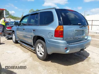 2006 GMC Envoy SLE with VIN 1GKDS13S362310613, listed as a IAAI auction lot 41881880 with 202,893 mi miles. Bid and sale history available at carsss.com. Image 3.