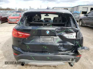 2018 BMW X1 xDrive28i with VIN WBXHT3C32J5L28030, listed as a Copart auction lot 47087415 with 100,708 mi miles and Salvage Title. Bid and sale history available at carsss.com. Image 6.