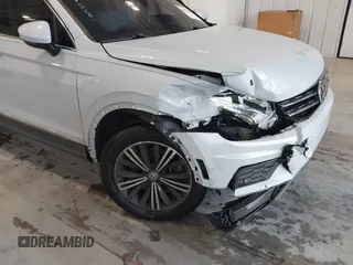 2019 Volkswagen Tiguan SE with VIN 3VV3B7AX9KM030028, listed as a IAAI auction lot 40445099 with 85,400 mi miles and . Bid and sale history available at DreamBid. Image 17.