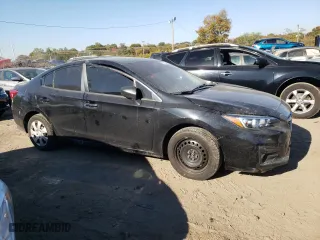 2019 Subaru Impreza with VIN 4S3GKAB60K3603418, listed as a Copart auction lot 77173244 with 49,221 mi miles and Salvage Title. Bid and sale history available at carsss.com. Image 4.