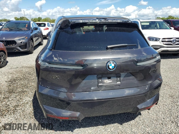 2024 BMW iX M60 z VIN WB533CF00RCN01751, wystawiony jako Copart lot #74145244 z przebiegiem 21 347 mil mil oraz Szkoda całkowita • Salvage title. Historia ofert i sprzedaży dostępna na DreamBid. Obrazek 6.